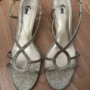 Gold 8 1/2 silhoutte heels .